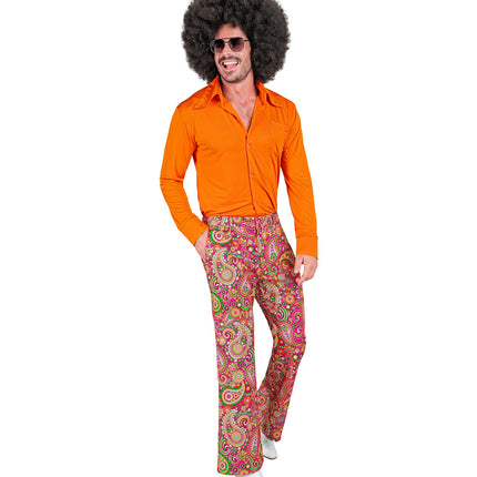 Jaren 70 paisley broek heren gedragen - kleurrijke hippie discobroek seventies