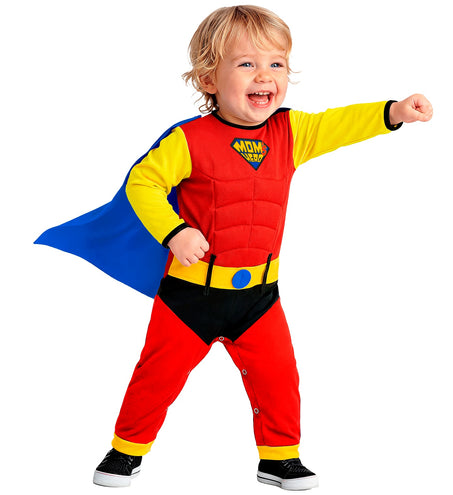 Superheld babyjumpsuit met wapperende blauwe cape en zwart broekdeel, staand gedragen