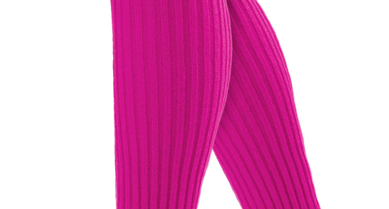 Beenwarmers neon roze ribgebreid, 40 cm lang over kuit en enkel gedragen voor een jaren 80-feest