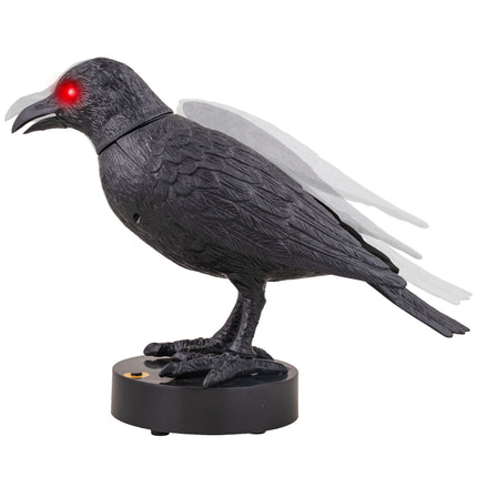 Bezeten kraai animatronic van zijkant met try-me-knop op de standaard en rood oog