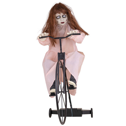 Cycling Cindy animatronic van voren met beide handen aan het zwarte stuur en voeten op de pedalen