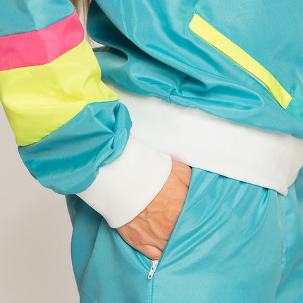 E-Carnavalskleding.nl Trainingspak Retro babe neon blauw