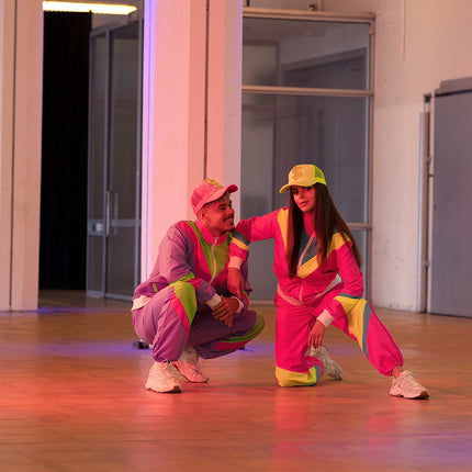E-Carnavalskleding.nl Trainingspak Retro babe neon roze