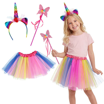 Eenhoorn verkleedset Starlight met regenbooghoorn, vlinderstaf en gelaagd rokje, los en gedragen door een meisje