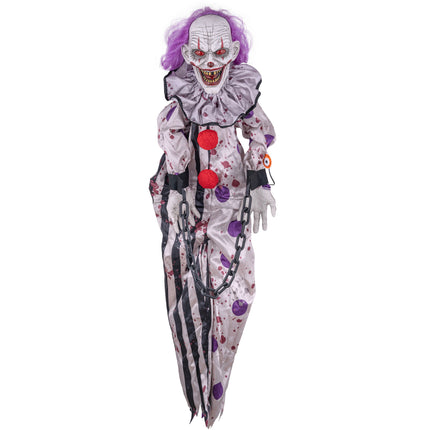 Hangende horrorclown decoratie 110 cm met paars haar, wit-zwart pak met rode pompons en ketting