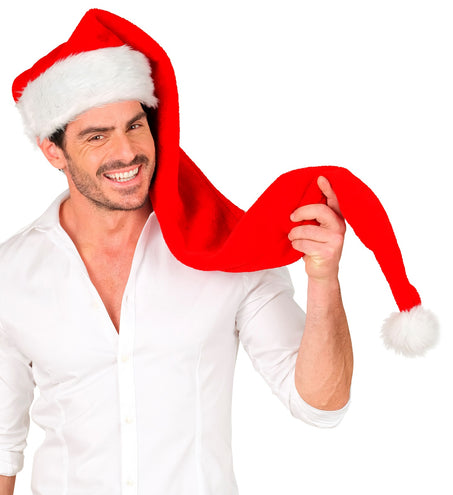 Heer met rode kerstmuts met witte bontrand die de lange punt met pompon vasthoudt