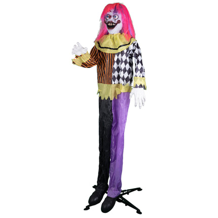 Horrorclown pop met grijnzend masker, witte handen en paars-zwarte broek op zwarte standaard