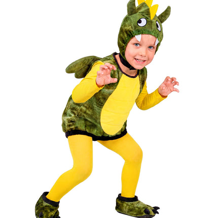 Kind in groen drakenpak met gele maillot, zijaanzicht met vleugels en gele rugkam