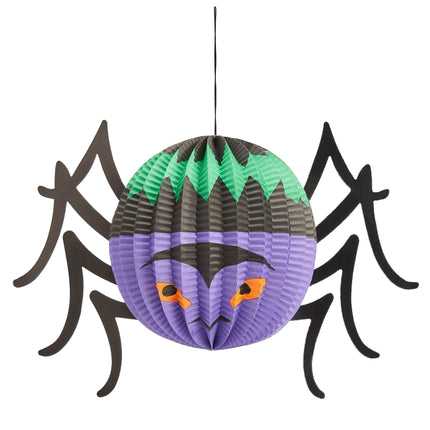 Lampion spin van paars papier met groene punten, oranje ogen en acht zwarte poten voor Halloween
