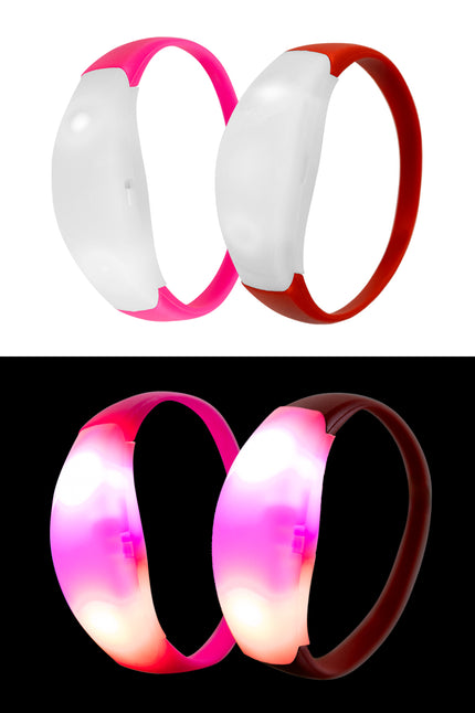 Lichtgevende led armbanden in roze en rood, uit en oplichtend met roze en witte lampjes