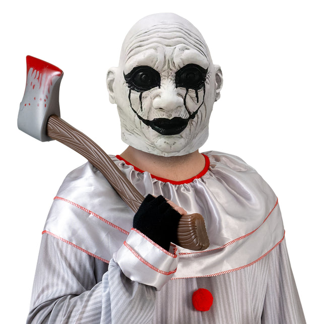 Masker latex zombie wit gedragen bij een wit clownkostuum op een horrorfeest