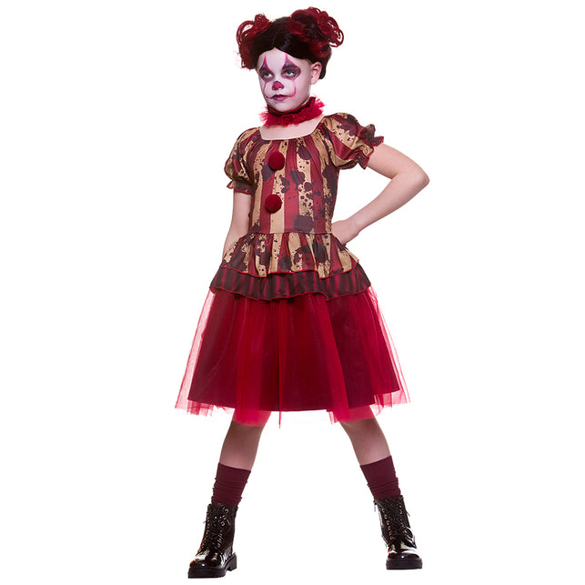 Meisje in zombie clown kostuum met rood-zwarte knotjes en griezelige clownschmink