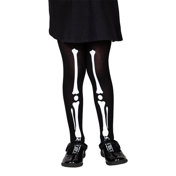 Panty kind Mila skelet in zwart met witte botten, gedragen onder een zwarte rok voor Halloween
