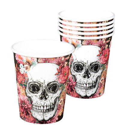 Papieren bekertjes Day of the Dead met witte schedel tussen roze bloemen, set van 10 gestapeld