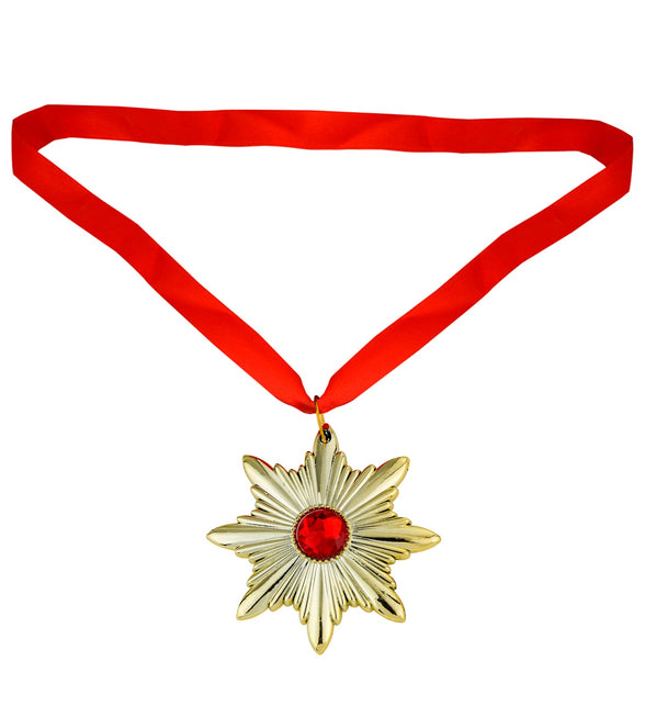 Rood lint van de ketting Dracula medaillon uitgelegd met de gouden sterhanger onderaan
