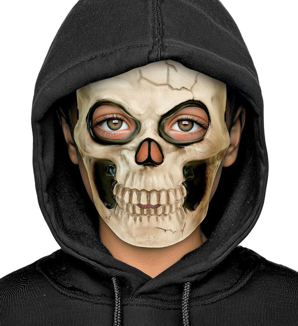 Schedelmasker op kindergezicht, halfmasker dat voorhoofd, neus en kaak bedekt