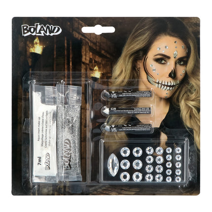 Schminkset diamantenschedel van Boland met witte crèmeschmink, zilveren glittergel, drie sticks en 25 steentjes