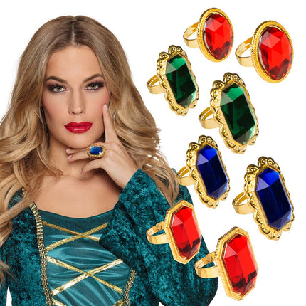 Set 8 ringen met nep edelsteen in rood, groen en blauw, met een blauwe ring aan de hand gedragen