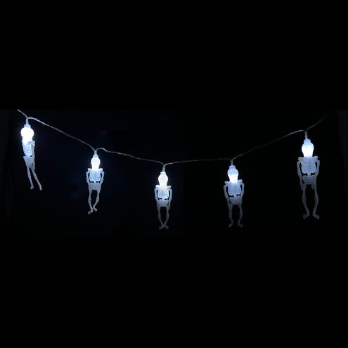 Skelet lichtsnoer van 165 cm met vijf witte LED-skeletjes aan doorzichtig snoer