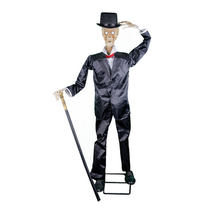 Staand skelet in zwart kostuum met hoge hoed, rode vlinderdas en wandelstok, 160 cm halloweendecoratie