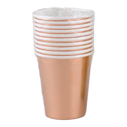 Stapel van acht roze metallic bekers in folieverpakking