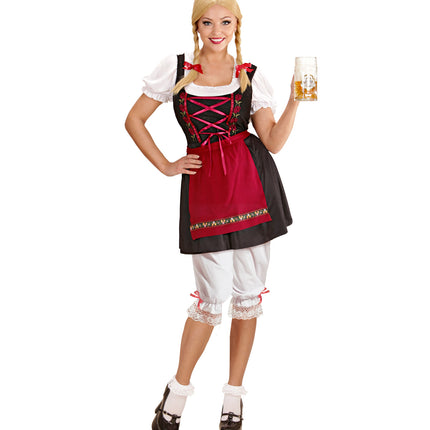 Tiroler broek wit met kant gedragen onder zwart-rode dirndl met rode strikjes bij de zoom