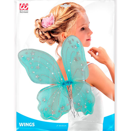 Verpakking van de turquoise glittervleugels met sterren, gedragen door een meisje als feeënlook