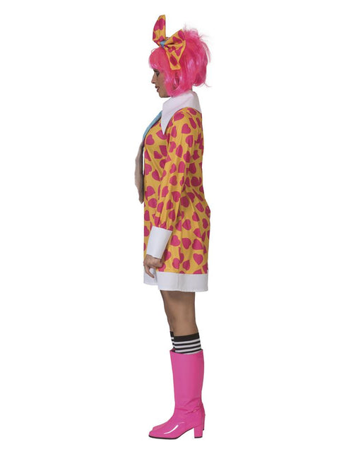 Zijaanzicht van de oranje clownsjurk Ciolina met lange mouwen, witte manchetten en strik in hartjesprint