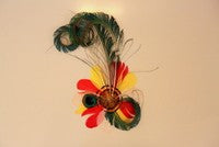 PartyXplosion Haarclip veren rood/wit/geel