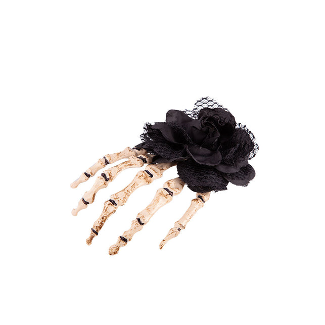 Wicked Costumes Hand skelet haarclip met zwarte roos